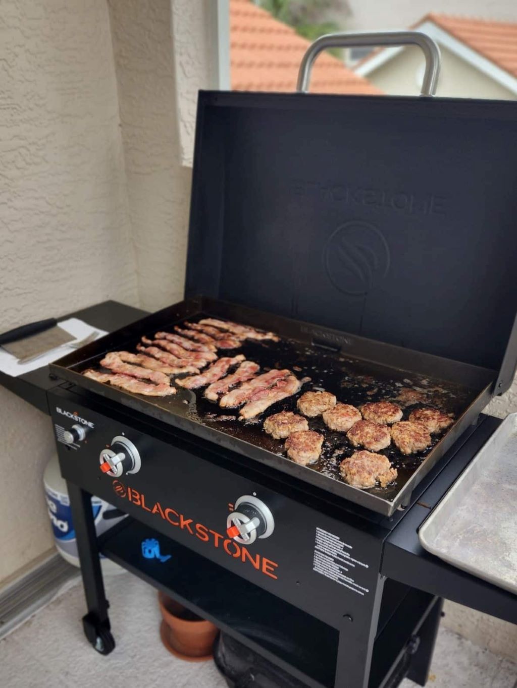 Close-up of a freshly seasoned Blackstone griddle with a smooth, shiny surface