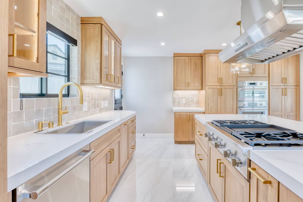 Contemporary kitchen featuring white oak cabinets, blending classic elegance with modern style