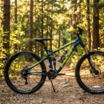 A sleek Dynacraft mountain bike parked on a sunny dirt trail.