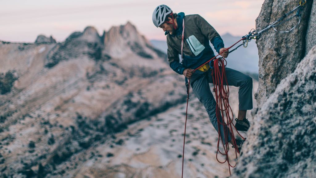 Rock climber using a strong climbing rope on a Washington cliff